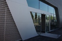 Perforated sheets used for Audi Terminal facade Brescia, Italy
